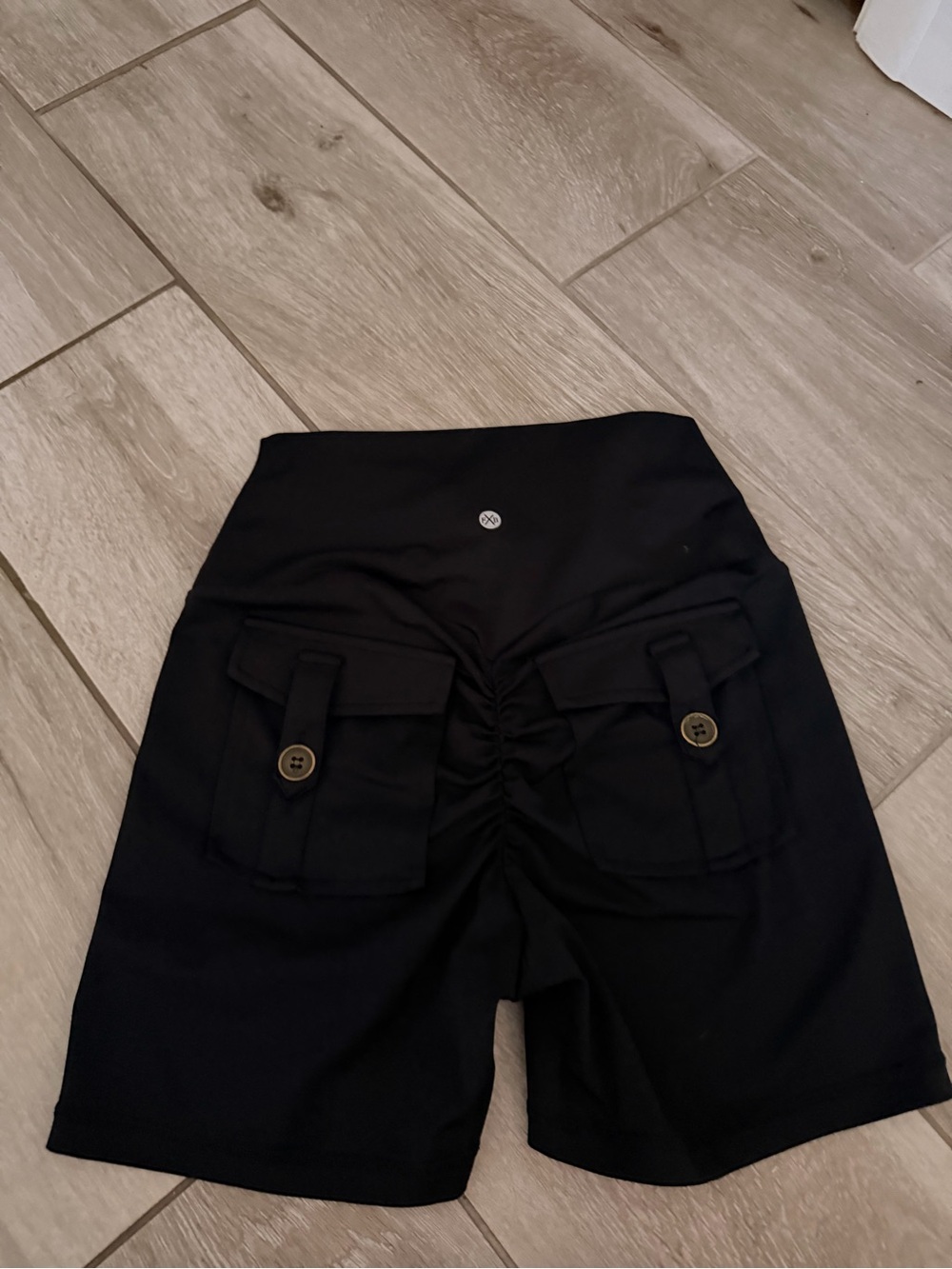 High-Rise Black Athletic Cargo Shorts with Button Flap Pockets